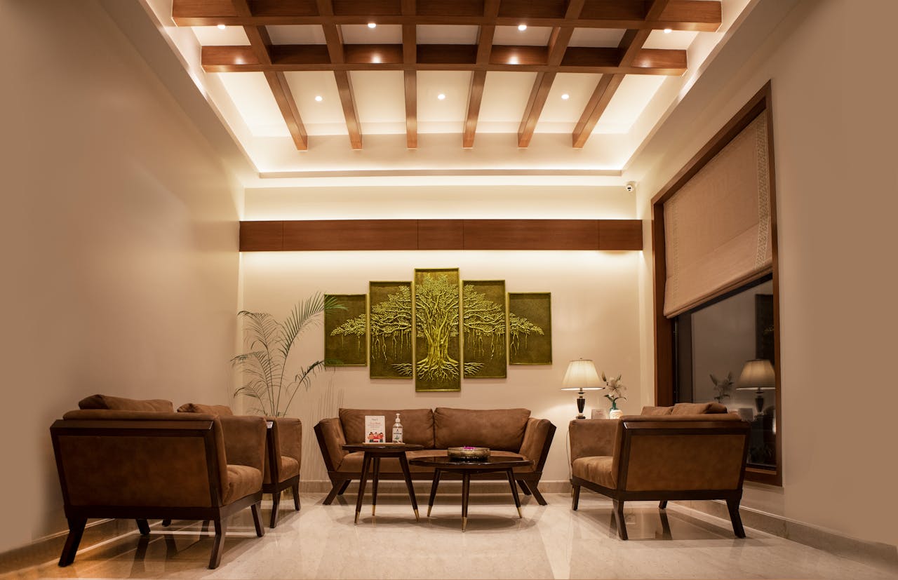 Mastering the First Impression: Your intriguing post title goes here Luxurious living room featuring elegant furniture, artistic decor, and modern interior design.
